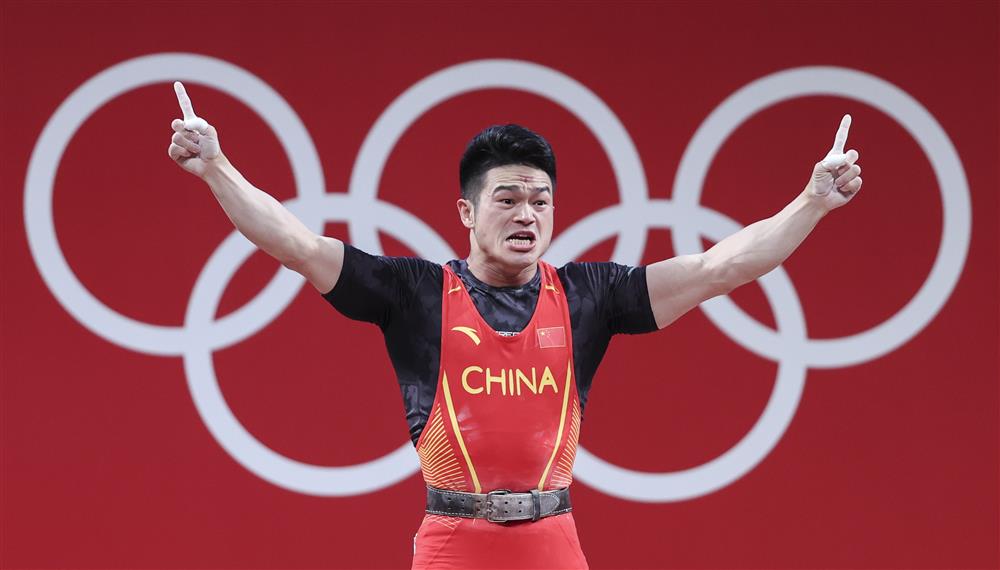 石智勇第二次奥运夺冠让网友纳闷额头的红色川字是否把王写反了