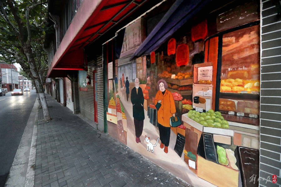 让旧改基地老房子"枯木逢春",人们给这群聋人画师点赞