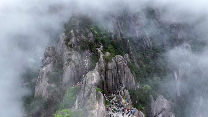 黄山风景区去年游客接待数官方口径不一:457.46万人次还是457.46万人?