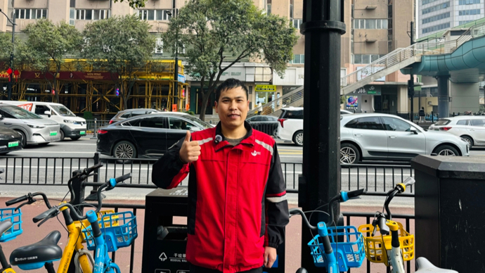 “三段码”后的快递人生：在上海的城市灯火里安家