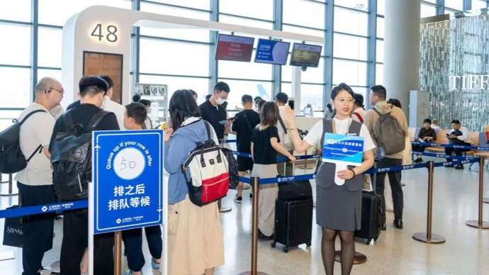 前排堵路、后排干等？虹桥机场推进分区登机试点，体验与效率提升