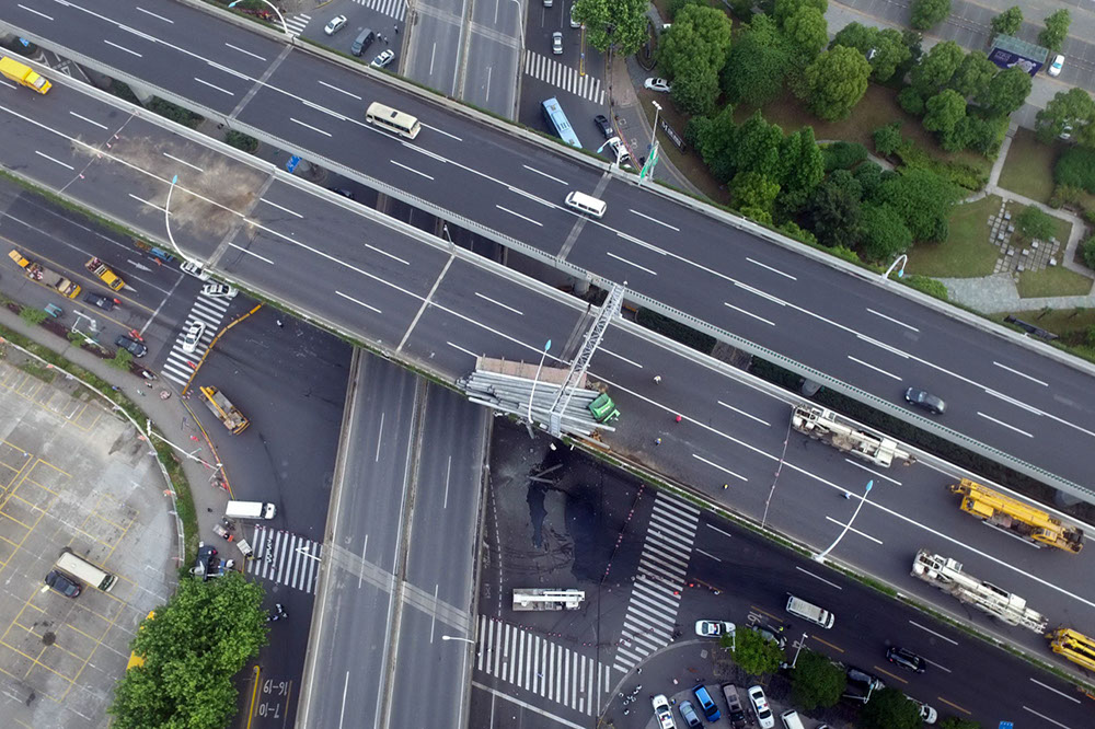 中断14天的中环沪太路内圈沥青铺好划线完毕马上通车